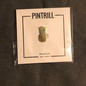 PINTRILL Pineapple gold tone enamel pin.